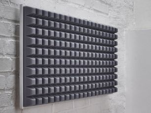 Premium sound absorber with trapezoidal profile