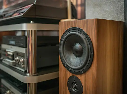 Soundproofing a loudspeaker improves its sound.