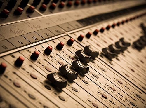 A mixing desk for studio recordings in the sound studio A mixing desk in a recording studio for sound recordings