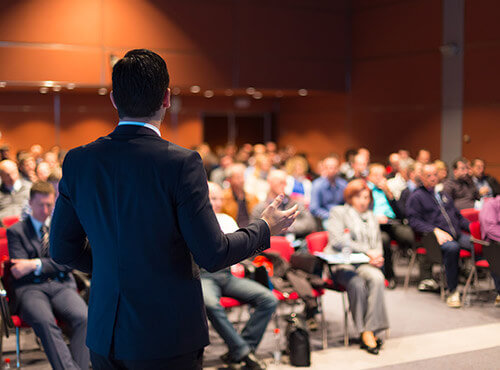 Good event acoustics and voice quality Sound insulation improves the acoustics in the function room – spectators listen excitedly to a speech