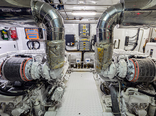 Engine room in a yacht View of the engine room: Ship's motors generate noise and vibrations.