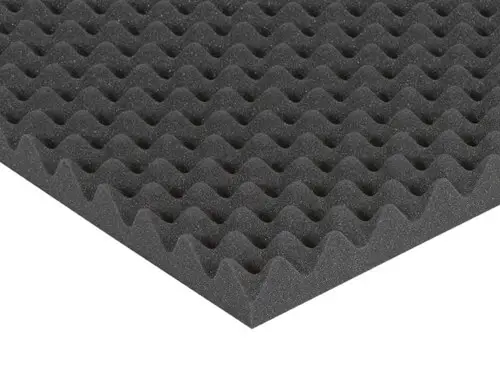 A sound absorber mat made from nubbed foam reduces noise.