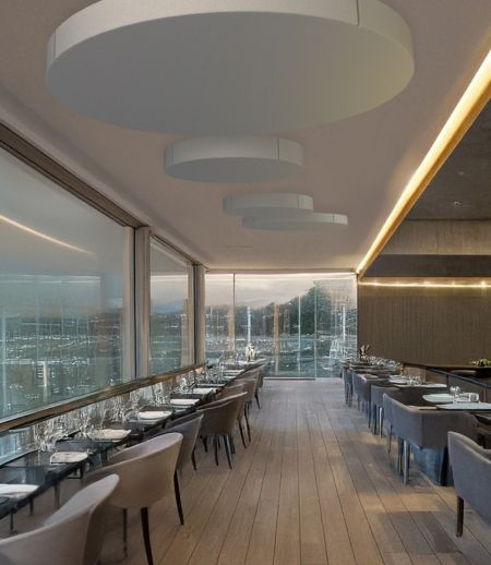 Round ceiling absorbers in gastronomy Round ceiling absorbers in gastronomy