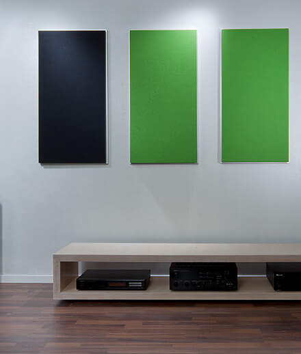 Sound absorbers with colored acoustic felt surface in a hi-fi studio