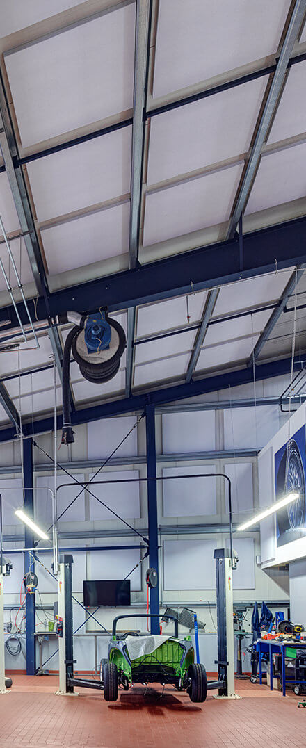 Flex Industry soundproofing panels on the ceiling of a workshop