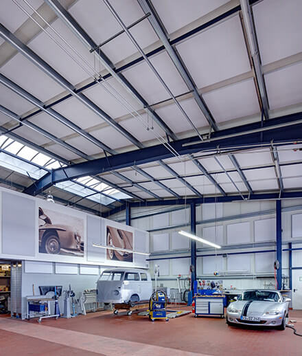 Flex Industry soundproofing panels on the ceiling of a workshop